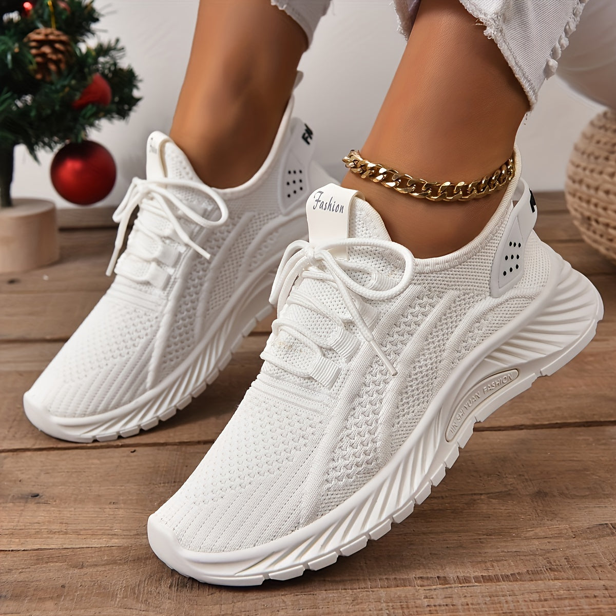 Trendy white knit fabric sneakers for women with EVA sole and breathable lace-up design, suitable for all seasons. Lightweight and stylish.