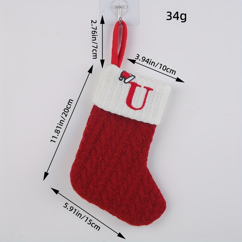 Knitted letter Christmas socks for home tree ornaments; red socks in gift bag for festive attire.