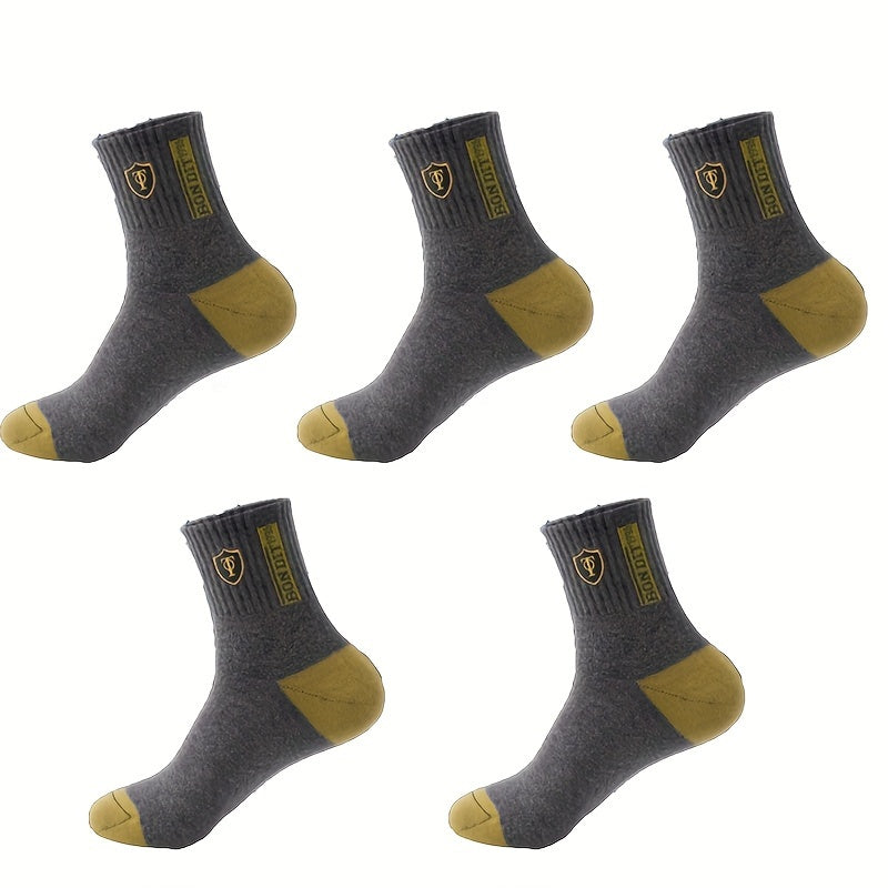 5 pairs of comfortable, trendy crew socks for men, breathable and soft for casual wear.