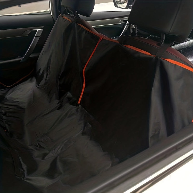 Heavy-duty waterproof dog car seat cover with bright orange trim, ideal for travel and protecting rear bench from scratches and dirt.