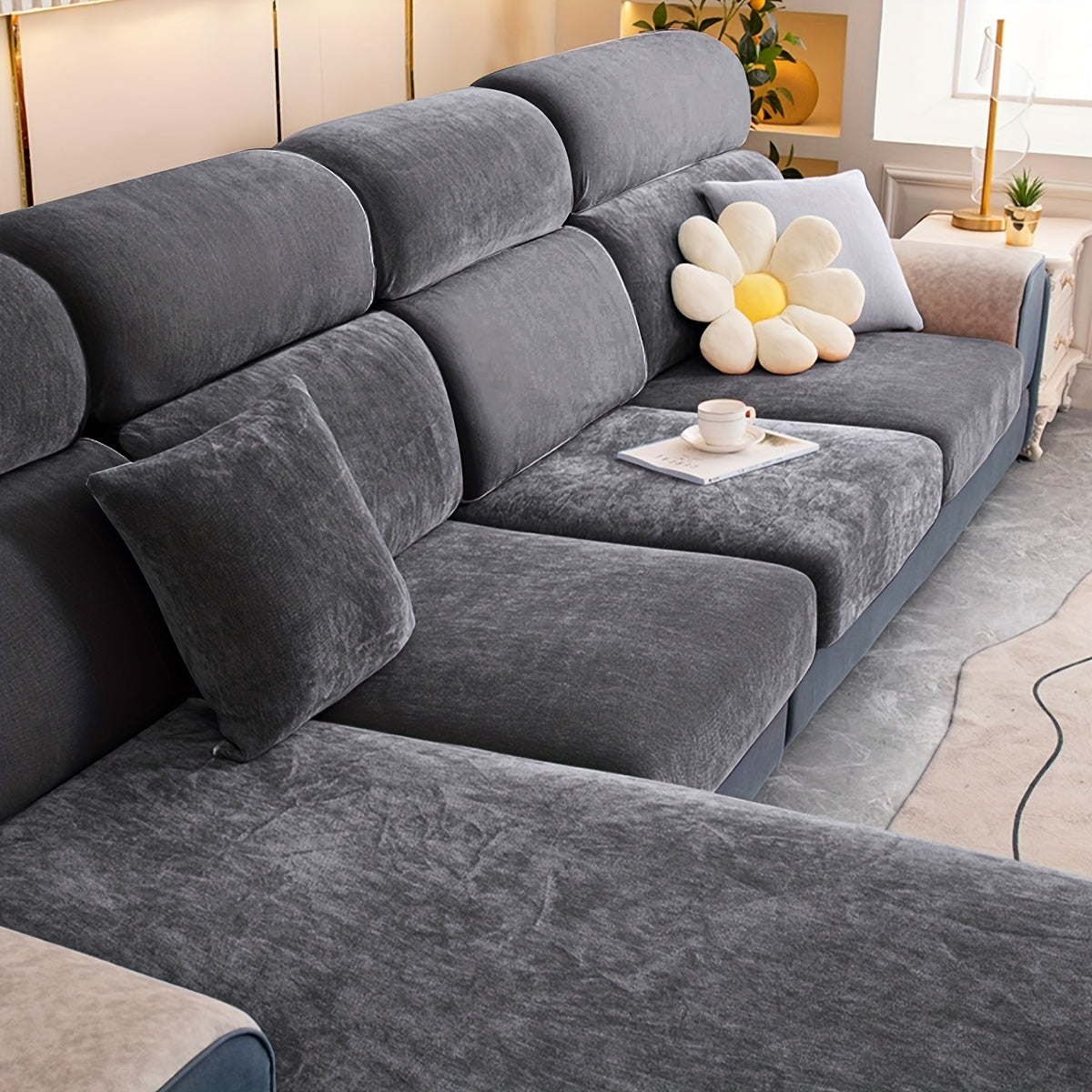 Stretchable plush velvet sofa cushion cover in contemporary gray with white accents; fits 1 to 4-seater sofas, machine washable, perfect for home decor.