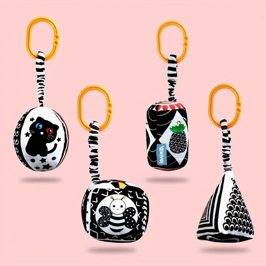 Geometric-shaped black and white hanging toys for babies, designed for early education and visual stimulation. Perfect for attaching to strollers, car seats, or hanging over baby's bed.