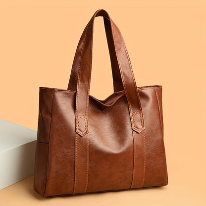 Spacious PVC tote bag for women in light brown, gray, and black. Features secure zip closure, decorative stitching, and versatile style. Ideal gift for friends, girlfriends, and moms.