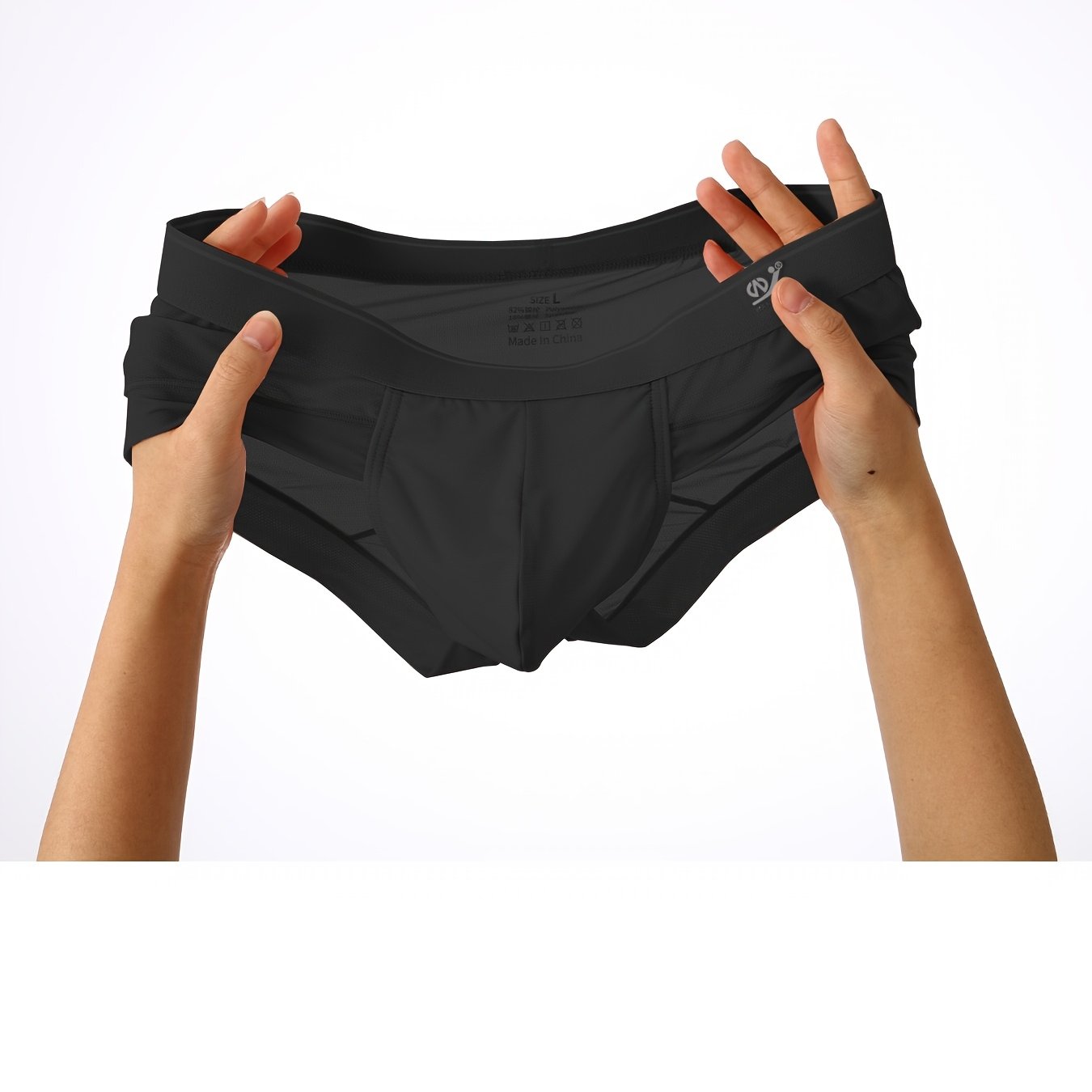 Men's low-rise briefs made of ultra-thin fiber knit fabric with breathable mesh and quick-dry features. Casual sport shorts in solid color with high stretch and sheer details. Made of 82%