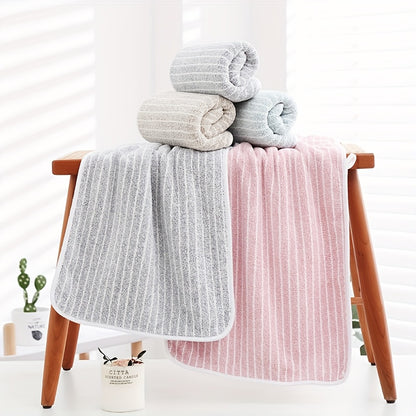 A 140cm*70cm plush bath towel perfect for home, hotel, kitchen, and more. Ultra-absorbent, soft, and gentle on skin.