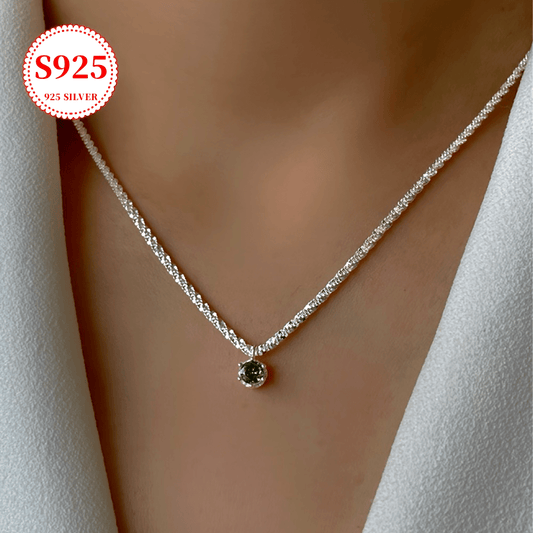 This elegant S925 pure silver necklace features a green star pendant, perfect for the summer season. The small wave design and shimmering olive green color make it a luxurious and versatile accessory for daily wear. Whether for a casual outing or a