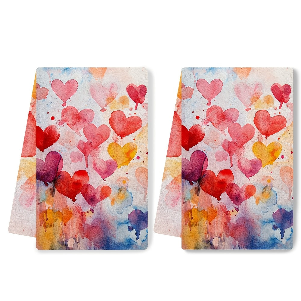 Set of 2 Ultra Soft Kitchen Towels featuring a Valentine's Day Heart Splash Design. These towels are highly absorbent, machine washable and measure 40.64x60.96 cm. They have vibrant watercolor hearts perfect for adding a festive touch to your home decor.