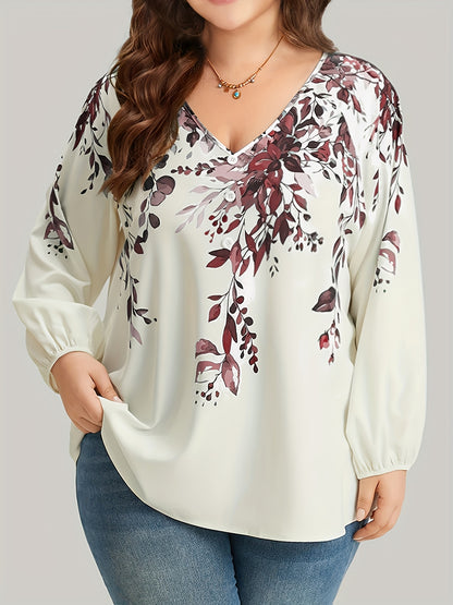 Floral print plus size blouse with V neck and long sleeves for spring. Women's plus size clothing.