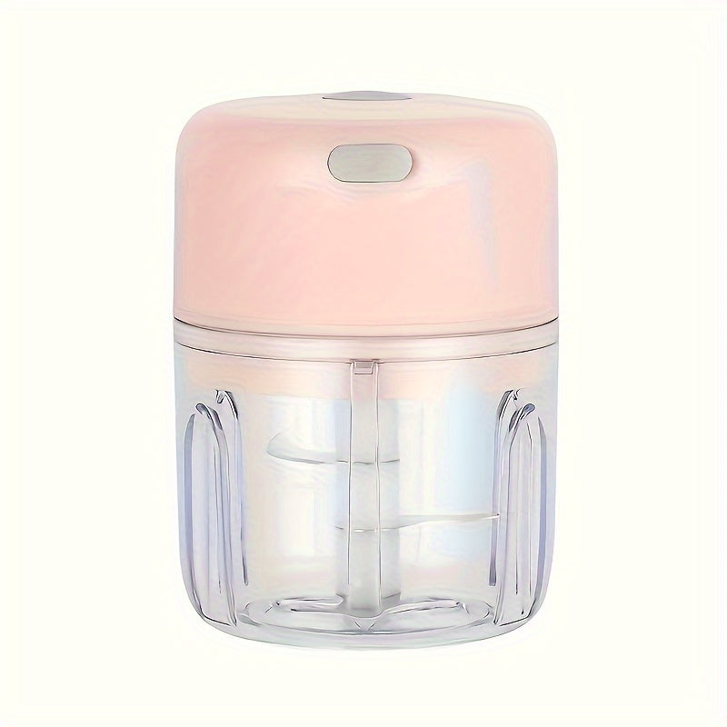 Compact electric mini food chopper with USB rechargeable battery, ideal for chopping garlic, vegetables, fruit, and meat.