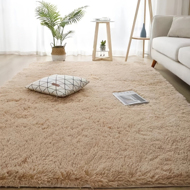 Luxurious soft plush faux fur area rug with anti-slip knitted polyester backing. This machine-made thick, warm, and fluffy mat is perfect for bedroom and living room use. It is hand washable and stain-resistant, making it easy to care for and