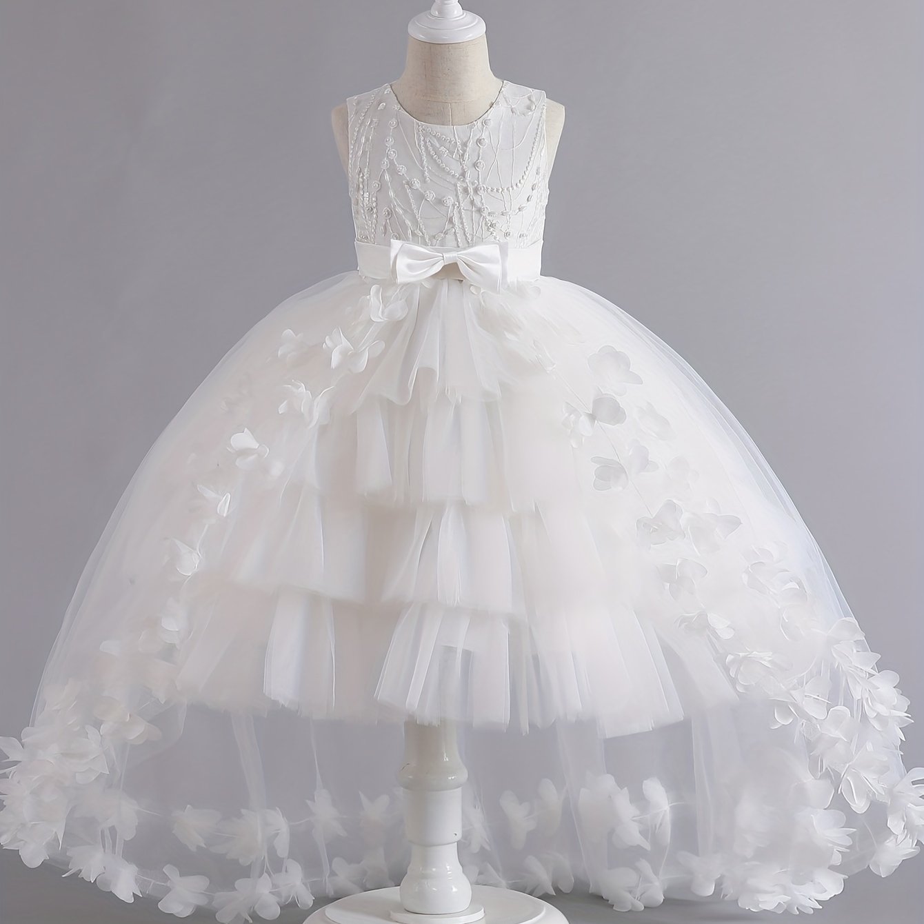 Girls' sleeveless princess gown with floral embroidery and tulle skirt, perfect for pageants, weddings, and formal events. Machine washable, made of polyester.