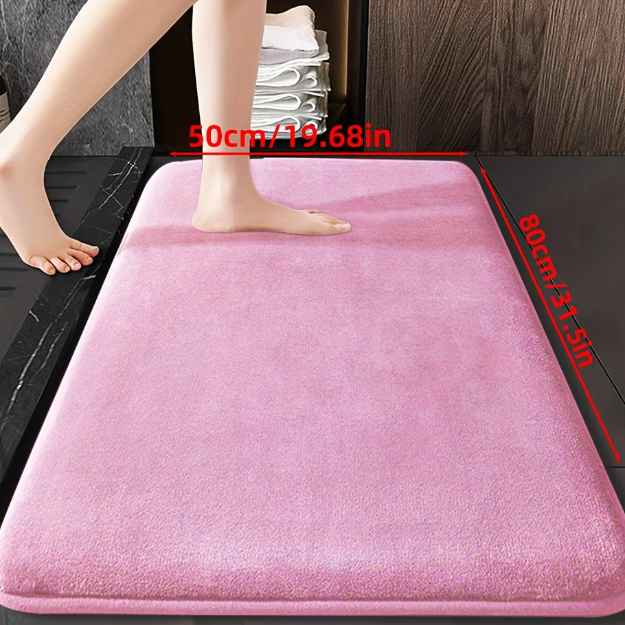 Soft and durable polyester bathroom mat with geometric design, ideal for shower, bathtub, bedroom, and living room. Versatile and non-slip, it is highly absorbent and machine washable.