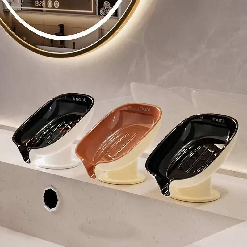 Durable plastic oval soap dish with an elegant, self-draining design for bathroom use.