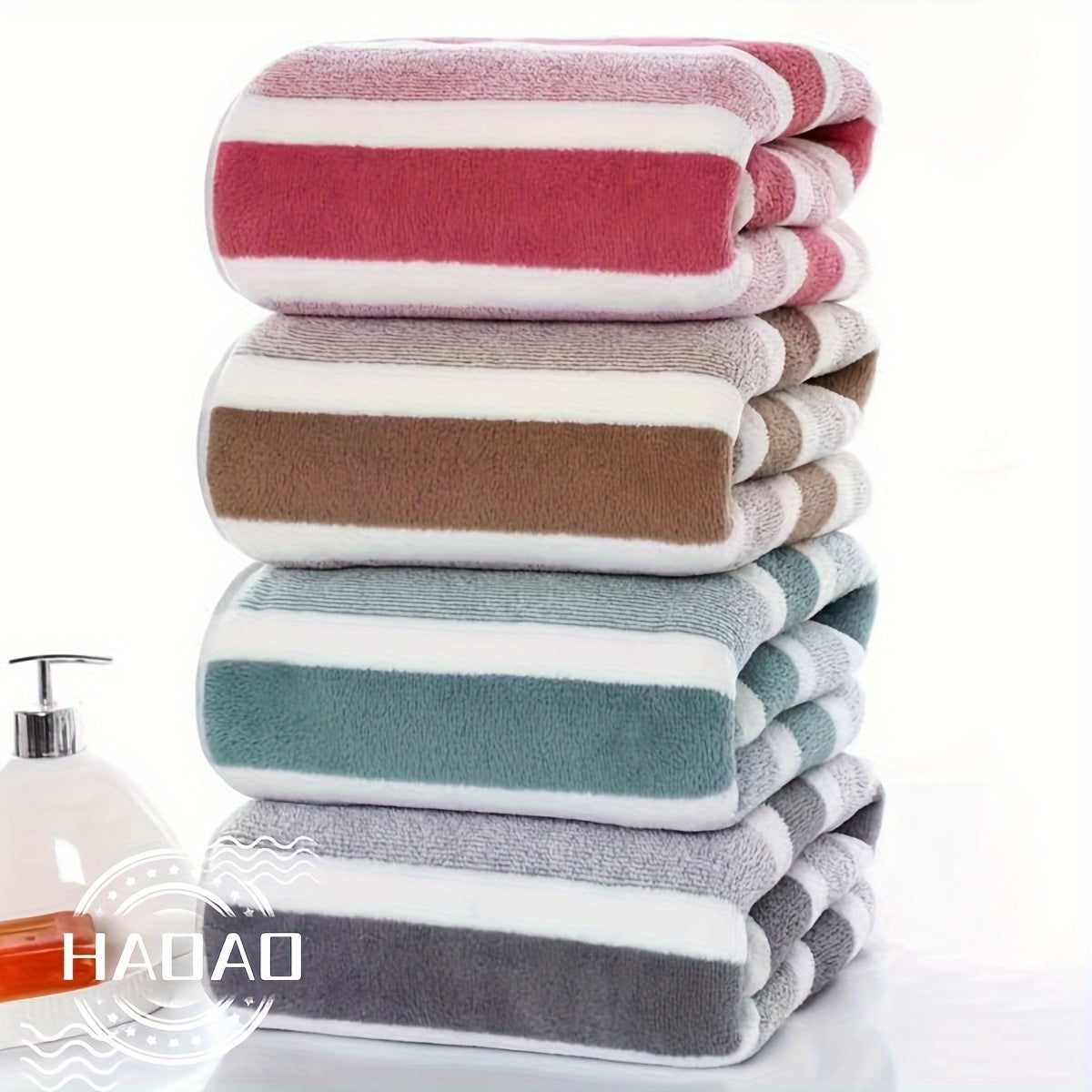 Modern 4-piece coral fleece towel set with geometric pattern, made of 100% polyester for softness and quick-drying absorbency. Ideal space-themed bathroom essential.