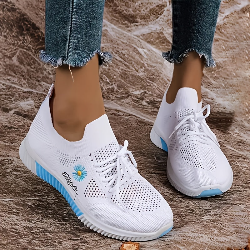 Women's breathable sneakers in chic white and pink with floral embroidery, lightweight and durable for outdoor activities.