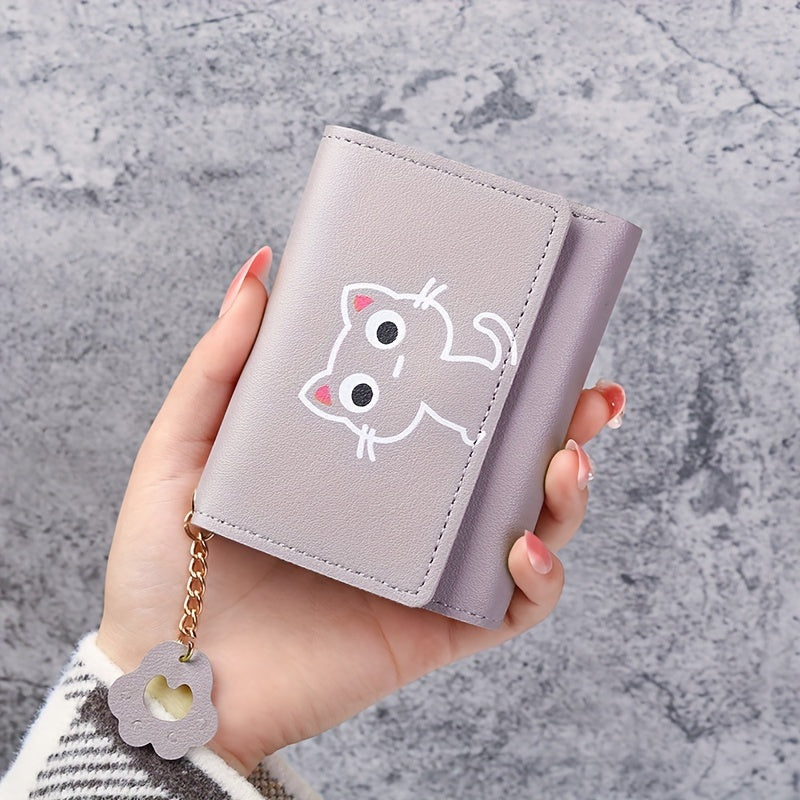 1 Cute Cat Cartoon Mini Wallet for Women made of pink faux leather, features a short tri-fold design with key ring and heart charm. Ideal for daily use and as a gift for cat lovers.