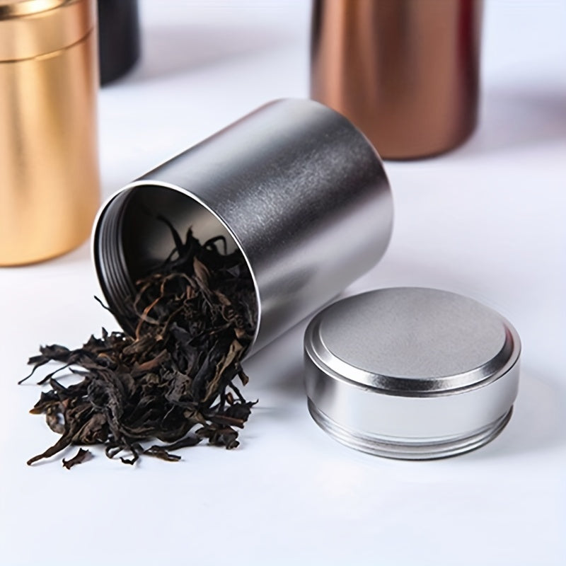 Compact and innovative, this tea packaging box is a portable canister crafted from titanium-aluminum alloy for durable and secure storage of tea leaves.