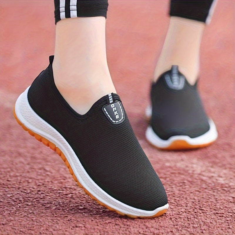 Casual slip-on women's fashion sneakers with breathable fabric and rubber sole for all seasons, featuring a low top European design.