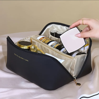 Double-layer travel cosmetic bag in leather for men and women.