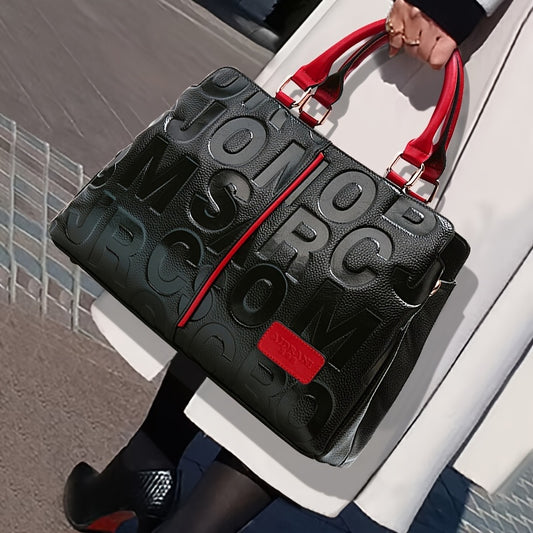 Luxury leather tote bag with embossed letters for women.