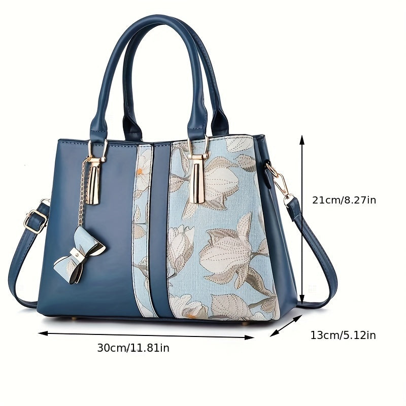 Chic floral print handbag with a spacious crossbody design.