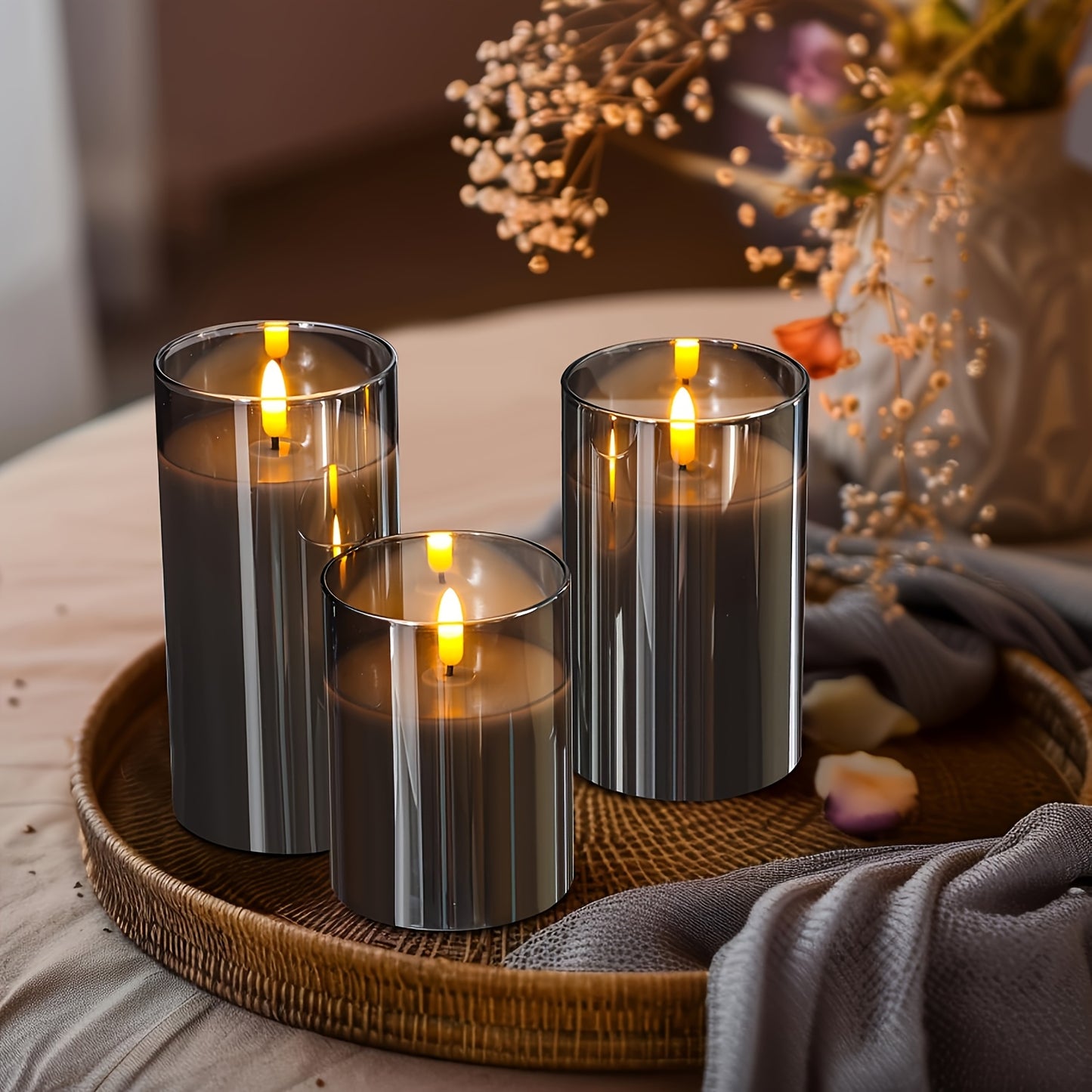 Three gray fireless LED candles with remote control and timer, battery-operated plastic column candles with realistic flashing effect, powered by non-rechargeable AA batteries, suitable for