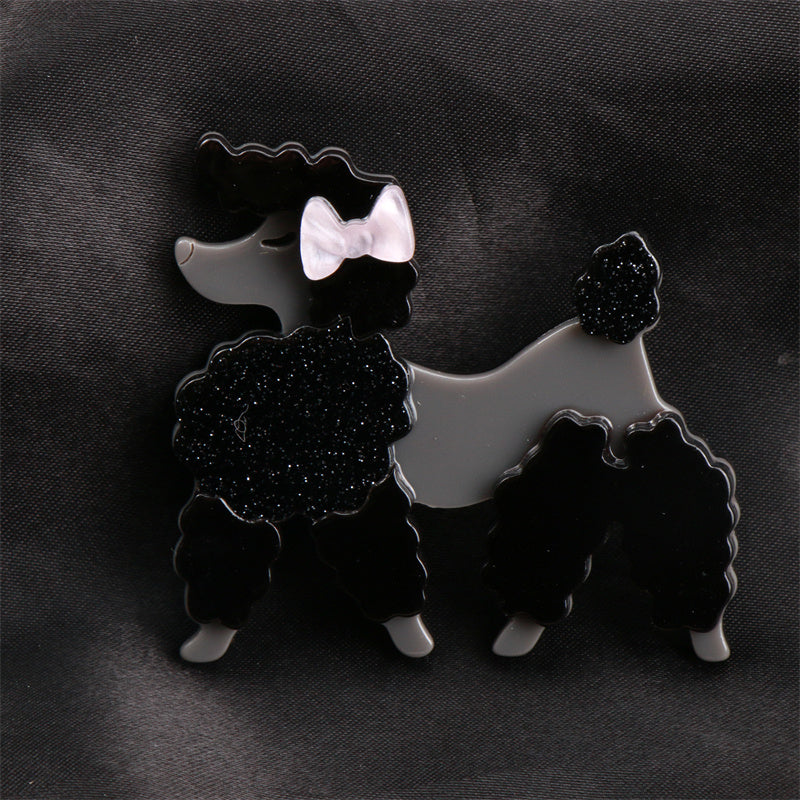 Add flair to your outfit with this Acrylic Black Poodle Brooch! This unique pin exudes charm and adds a touch of sophistication to any look. It makes a perfect accessory gift for friends during the holiday season.