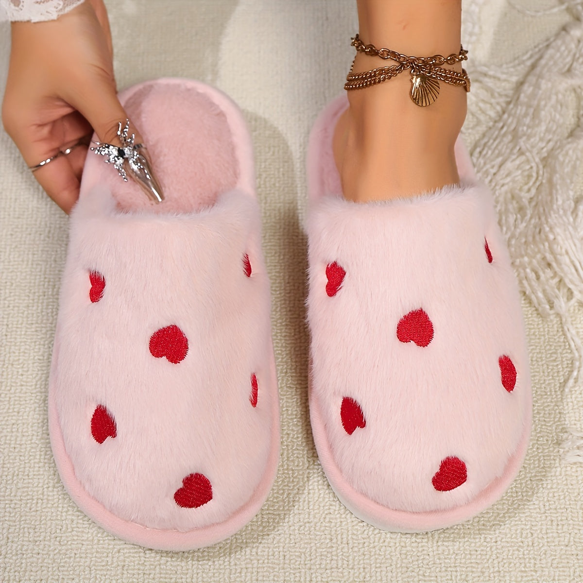 Soft and warm women's winter slippers with heart pattern - cozy and cute design, non-slip sole, hand washable, available in black, white, pink.