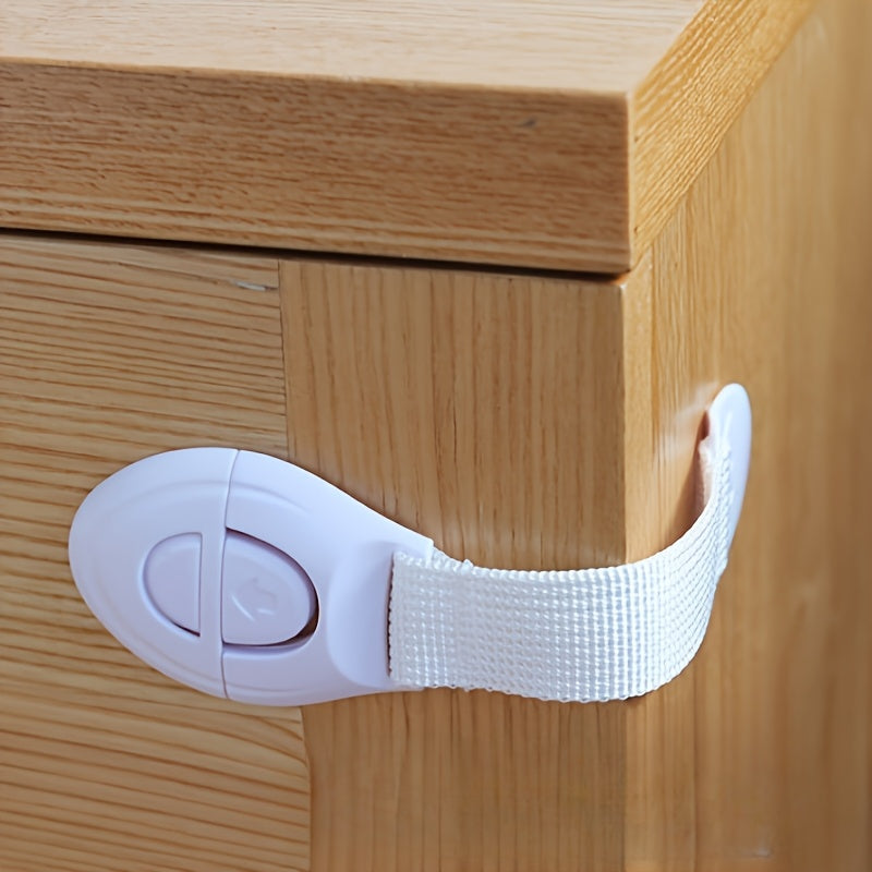 A set of 10 white plastic safety cabinet locks with adjustable childproofing straps, easy installation, tamper-resistant design, lead-free materials, suitable for securing drawers and doors for home security.