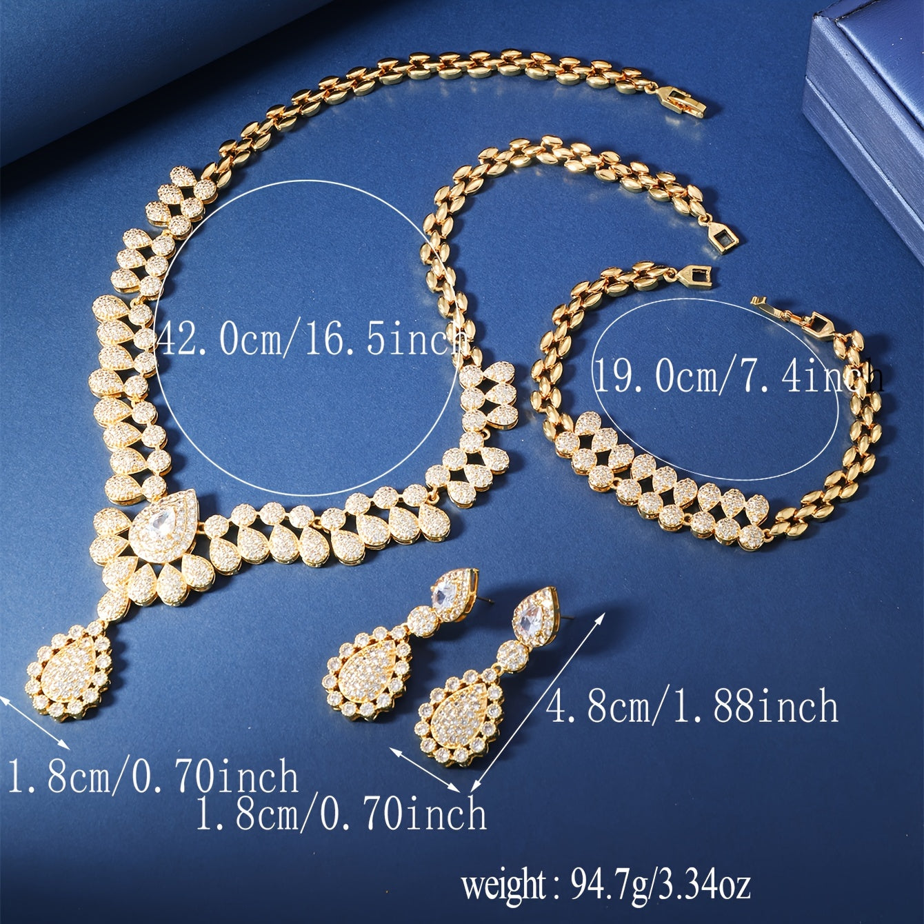 Elegant water drop women's jewelry set inspired by Middle Eastern design, featuring copper and full zirconia. Set includes 1 necklace, 1 bracelet, and 1 pair of earrings in a luxurious palace style.