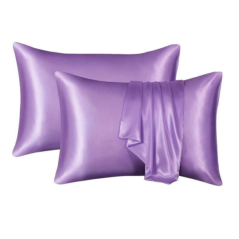 A set of two luxurious sateen pillowcases, each weighing 90g and featuring an envelope closure. Crafted from 100% polyester satin and silky fabric, these pillowcases are designed to be gentle on both hair and skin. They come in a variety of colors to