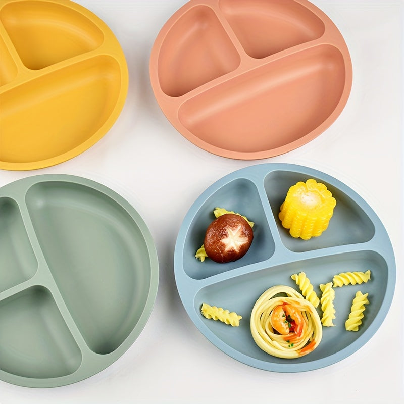 Three-compartment round dinner plate made of 100% food-grade silicone, featuring a reinforced design for added thickness and durability. This high-temperature resistant soft plate is perfect for training and comes with training tableware compartments.