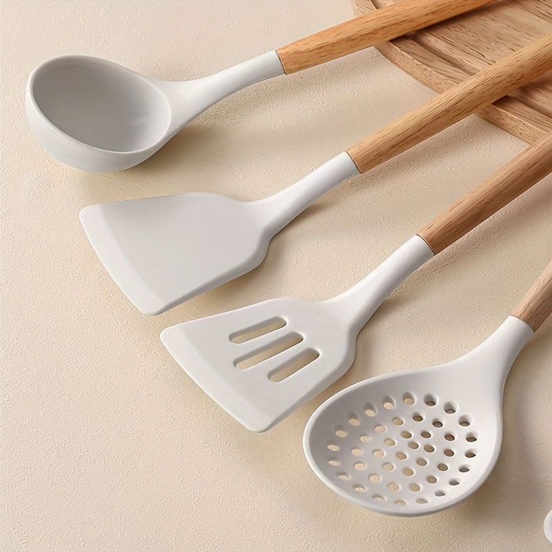 Complete your kitchen collection with the 43-piece Ultimate Kitchen Utensil Set. This set includes a variety of silicone and stainless steel cooking tools with stylish wooden handles, perfect for baking, grilling, and more. The set features spatulas