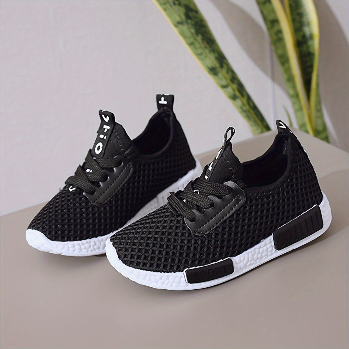 Breathable mesh sneakers for boys and girls, lightweight with lace closure and comfortable PVC sole.