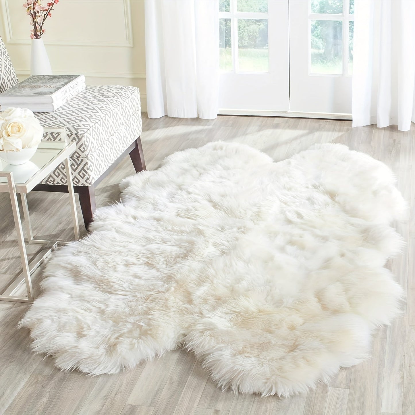 Soft and plush white faux sheepskin rug runner, perfect for nursery or living room decor. Machine washable with a flat weave, ideal for children's rooms. Measures a maximum size of 2.16m² and maximum length of 1.8m.