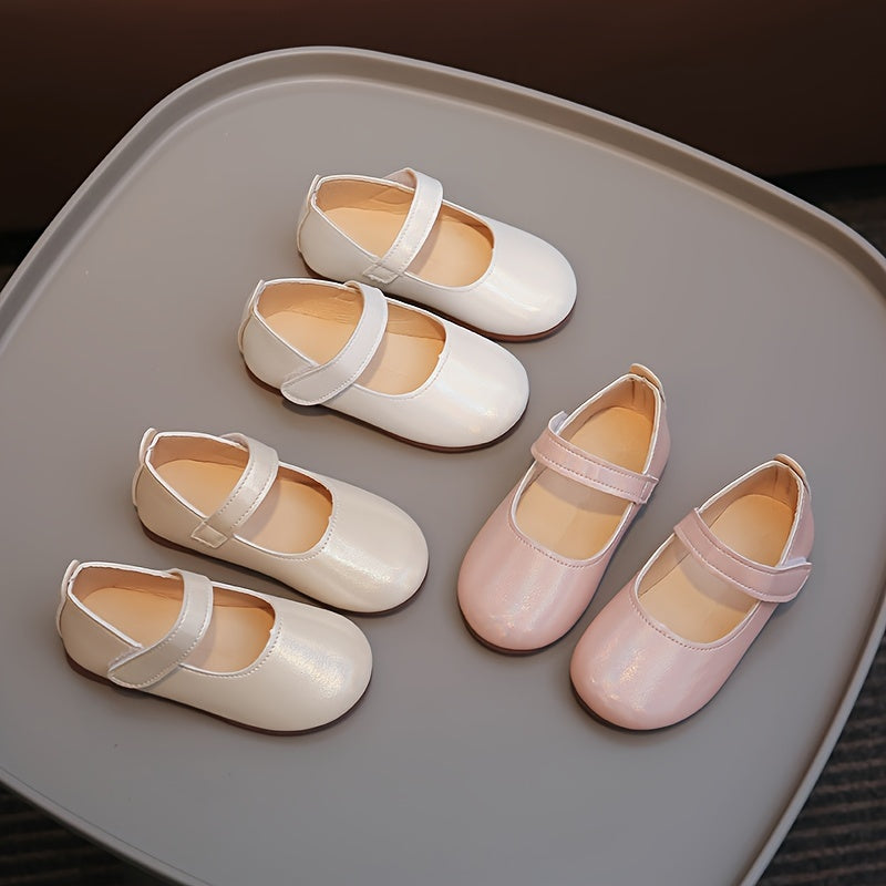 Stylish and cozy Mary Jane flats for girls - perfect for all seasons and styles.