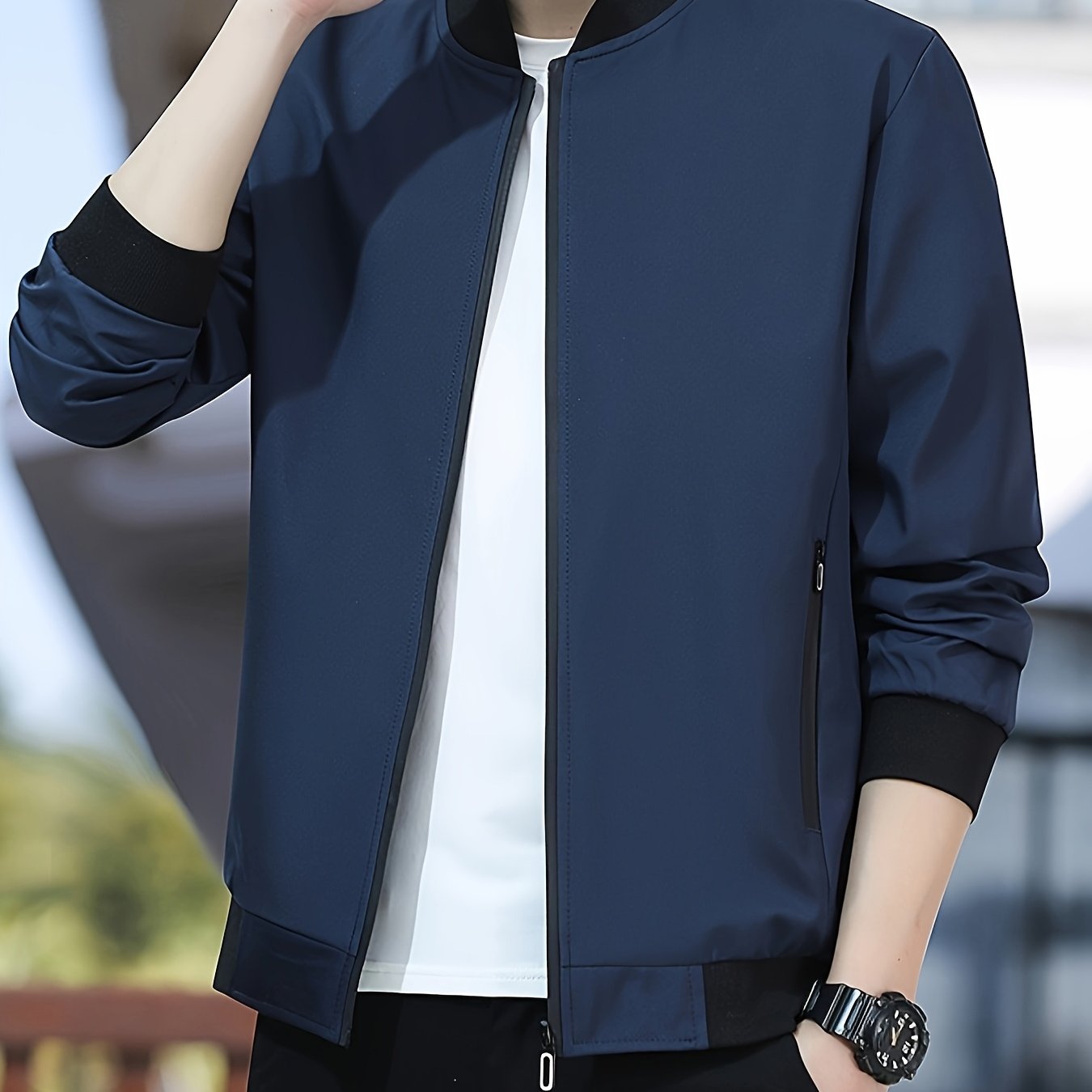 Long-sleeve, solid color men's jacket with small stand collar and zipper closure, perfect for outdoor activities.