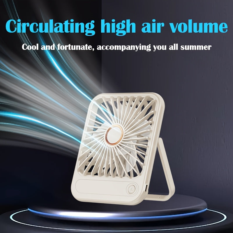 Compact USB rechargeable table fan with 3 speed modes and button control. Made of plastic, suitable for indoor and outdoor use. Rated at 5W, includes cord and built-in lithium battery for convenient office, bedroom, and camping use.