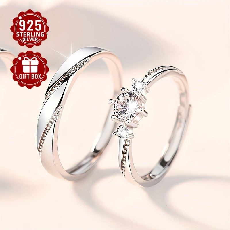 Set of 2 925 Pure Silver Couples Rings with Synthetic Zirconia, featuring 'Love at First Sight' design and openable ring. Each ring weighs approximately 4.6g. Perfect for engagement gifts or love tokens.