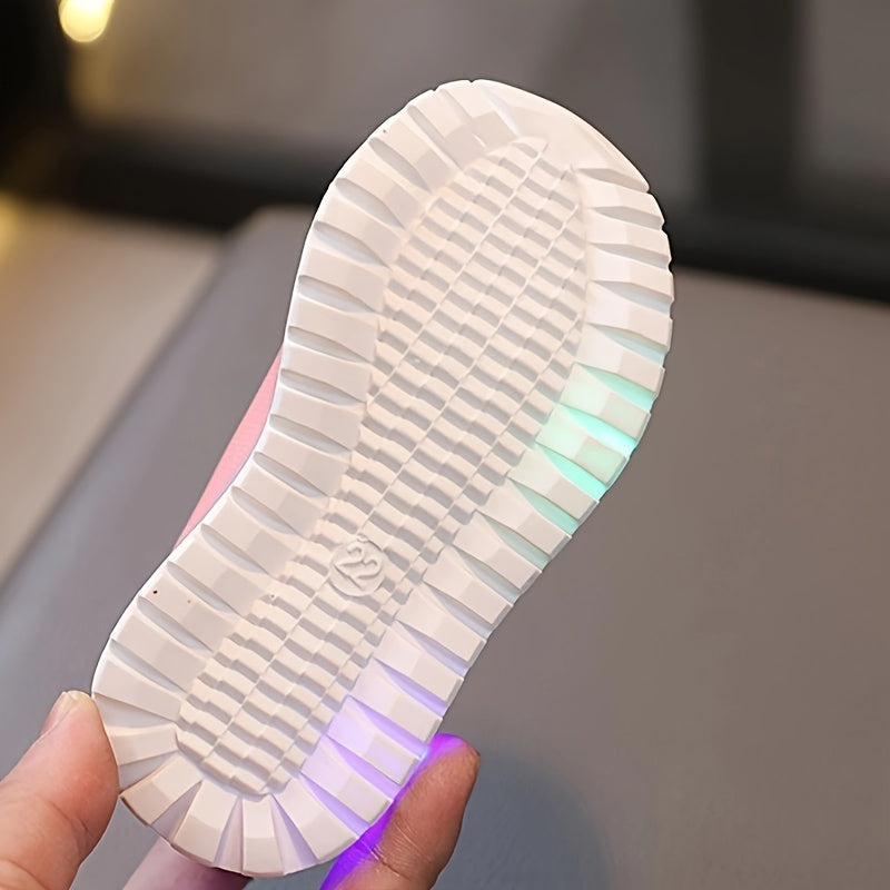 LED light-up sneakers for kids with breathable fabric and non-slip rubber sole, ideal for all seasons.