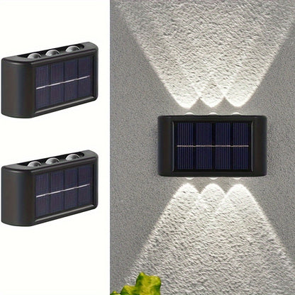 2 solar LED lights for outdoor decoration, easy to install on garden walls.