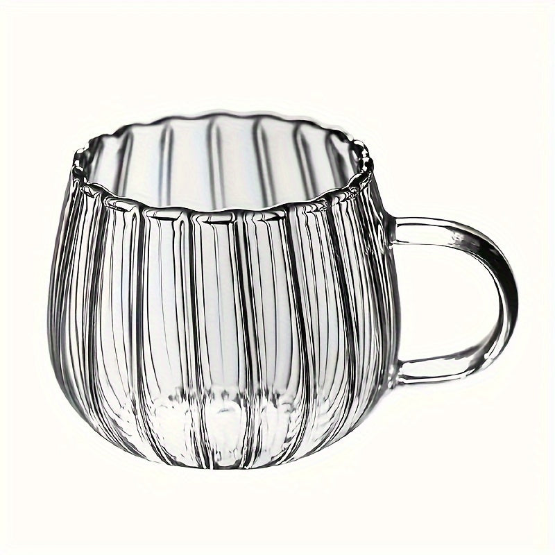 Pumpkin shaped glass cup, 350ml, insulated, hand wash only, suitable for various beverages.