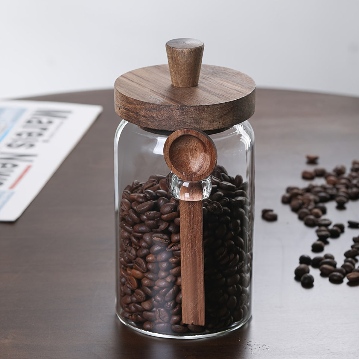 Glass containers for storing coffee, tea, grains, snacks, and pickles.