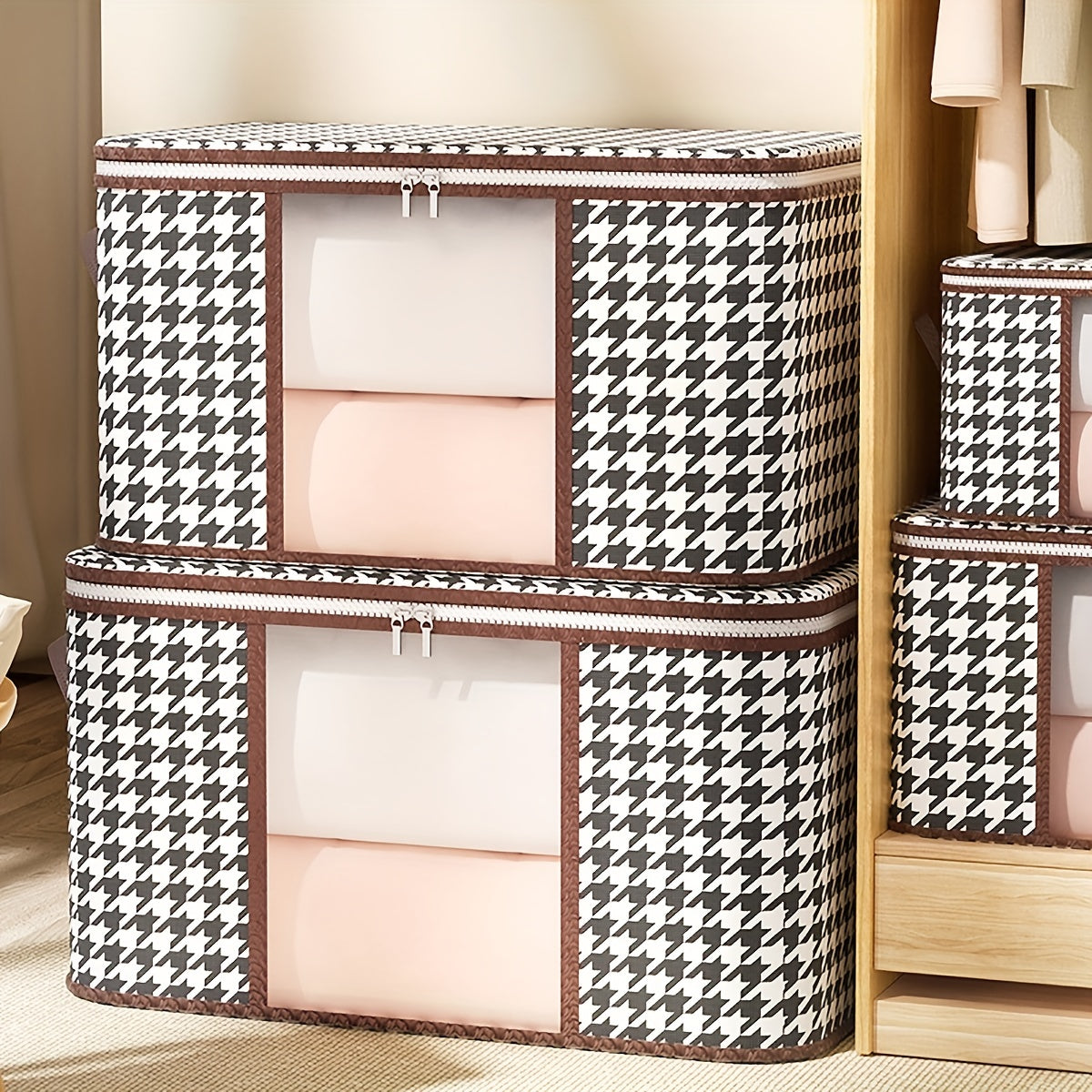 The Houndstooth Pattern Clothes Storage Bag with Transparent Window is a versatile and stylish option for organizing your wardrobe. Made of non-woven material, this quilt clothes organizer bag is dustproof and foldable for easy storage. It makes a