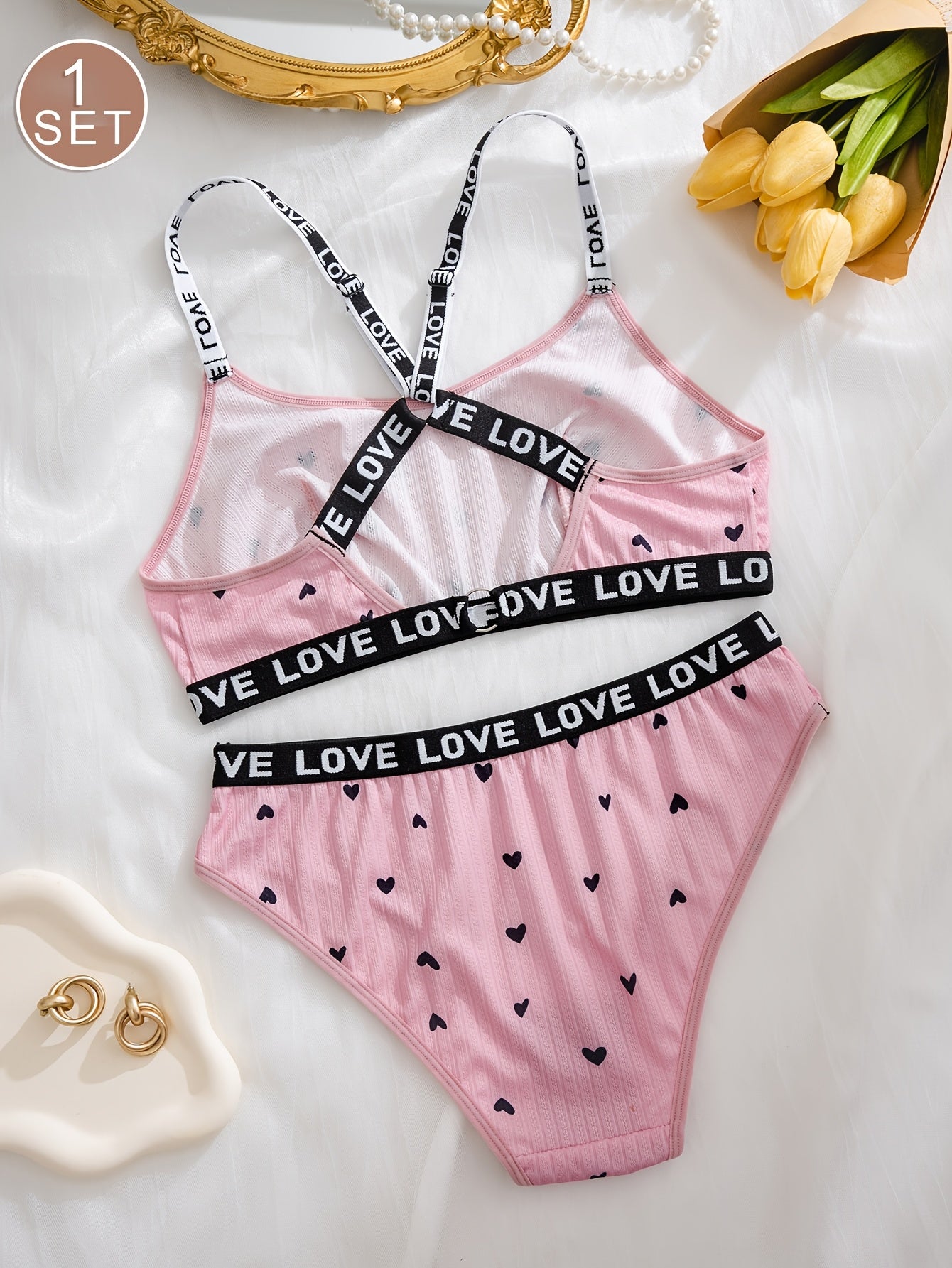 Women's sexy heart print lingerie set made from polyester knit fabric with LOVE strap detail, braid accent. Adult intimate apparel.