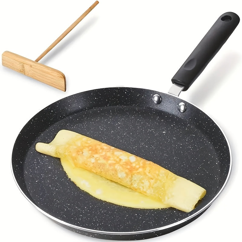 Stainless steel crepe pan with wooden spatula, non-stick granite coating, 26.67 cm, lightweight, rust resistant, induction compatible.