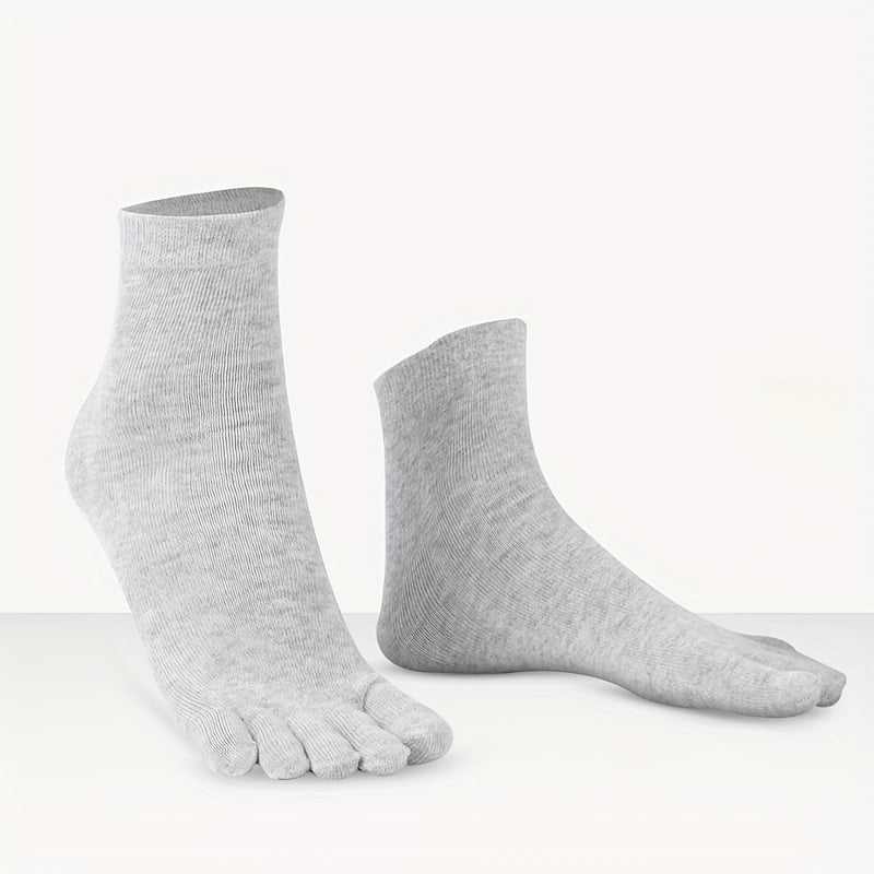 10 pairs of men's mid-calf split toe socks in solid colors.