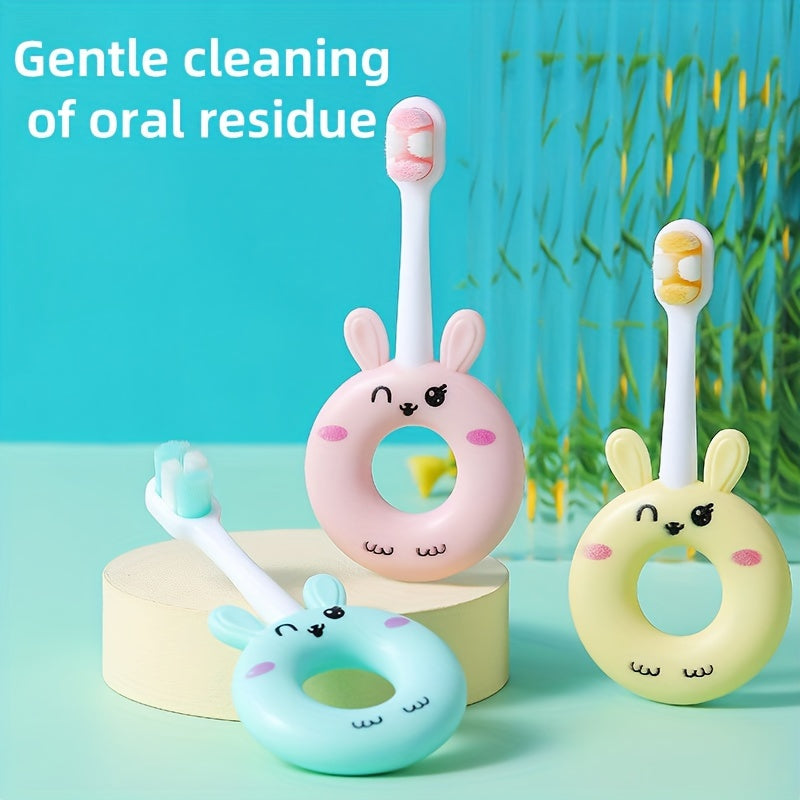 Gentle silicone baby toothbrush for toddlers aged 0-3. Features cute cartoon design and super soft bristles for gentle cleaning on sensitive teeth.