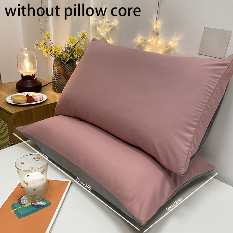 Get two ultra-soft brushed polyester pillowcases, weighing 90g each in a sleek light purple color. These rectangular pillowcases measure 50.8x76.2cm and feature an envelope closure. They are machine washable and perfect for adding cozy comfort to your