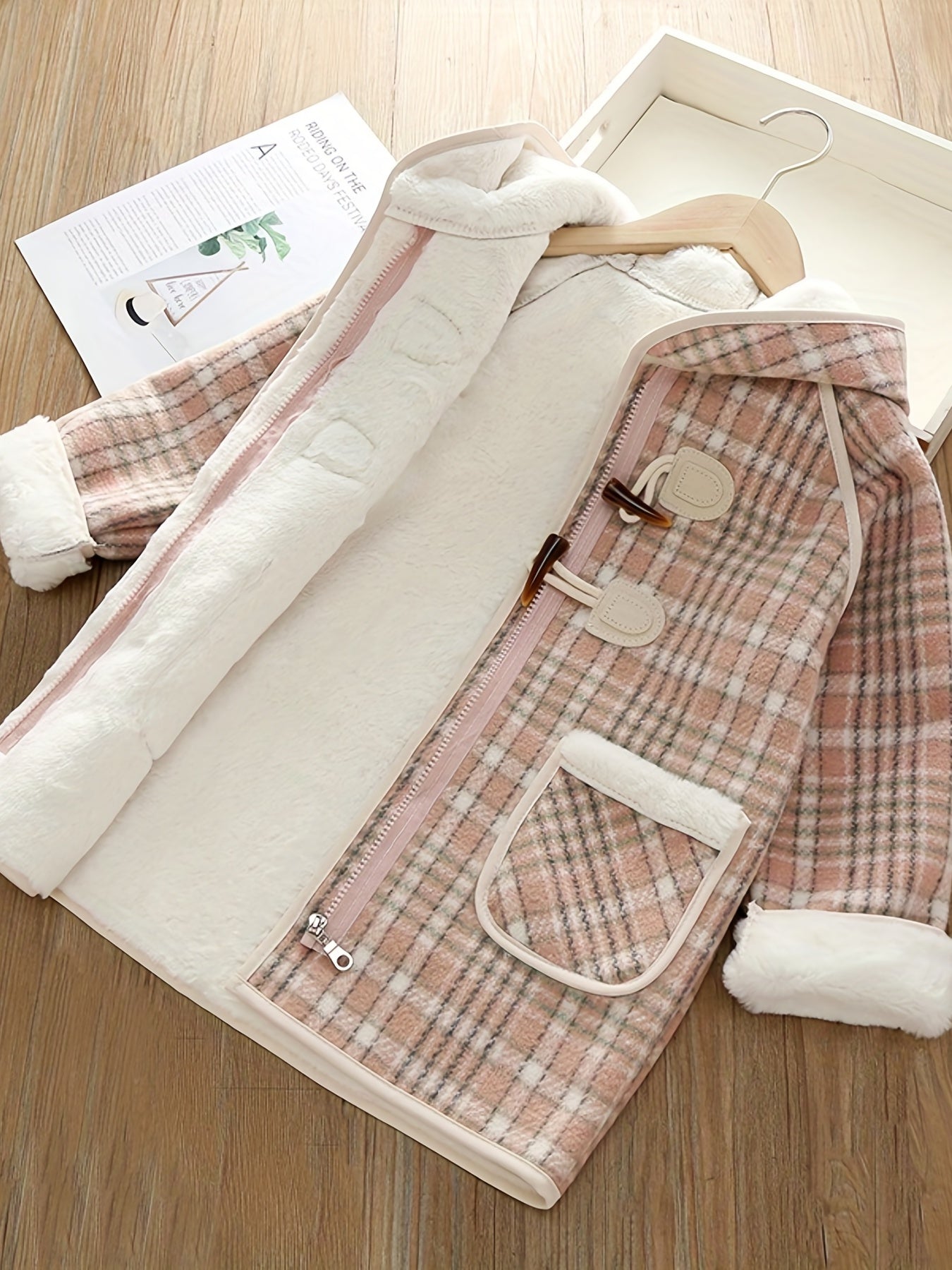 Girls' winter fleece plaid toggle coat with hood and pockets for a stylish outdoor look.